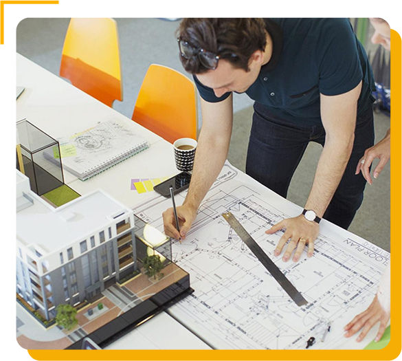 Architect preparing building plans and design drawings at Permit Canada